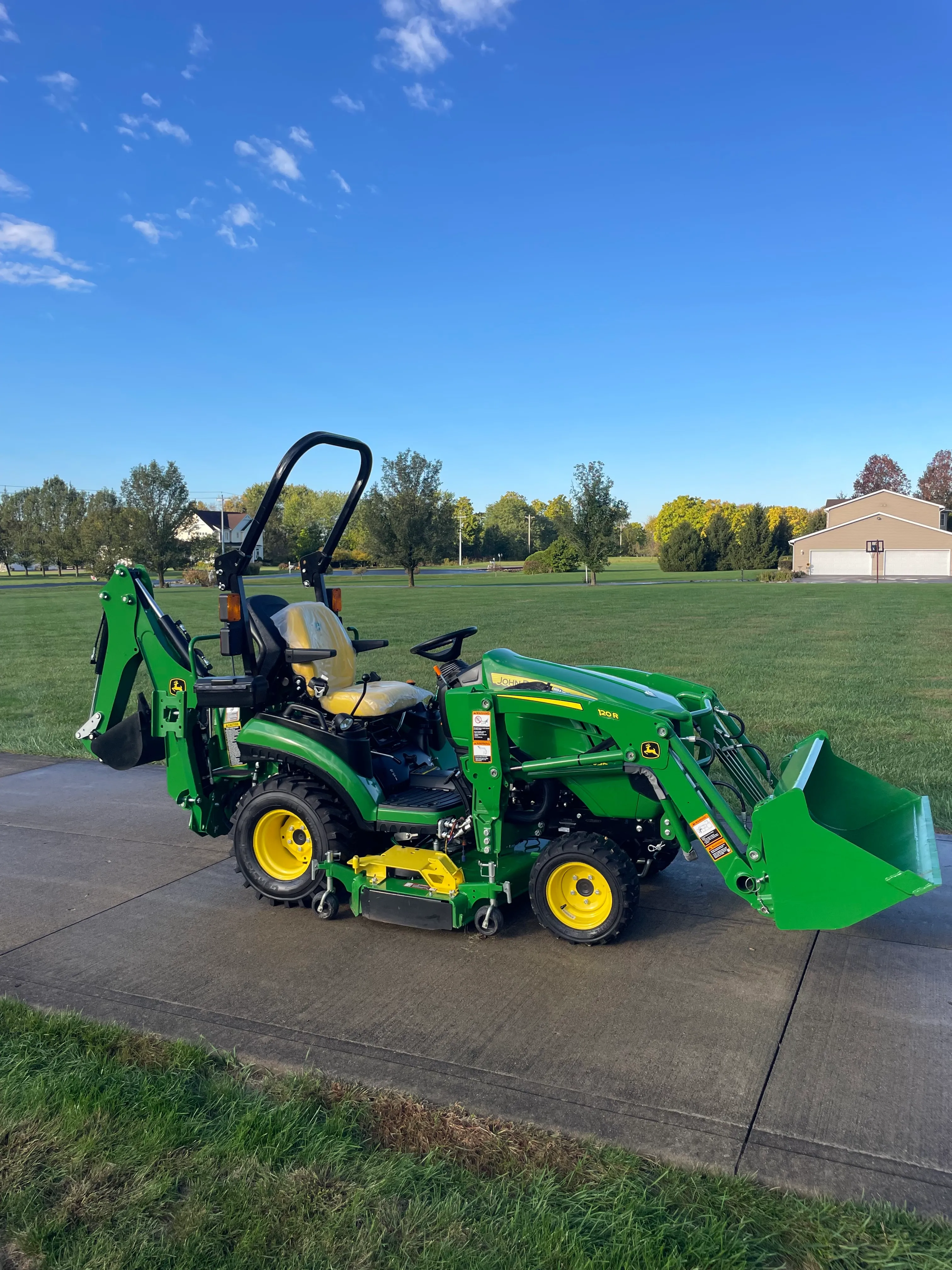 John Deere 1025R Tractor Package: Loader, Backhoe, Mower - Immaculate